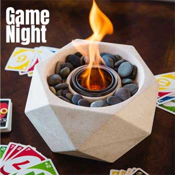 Table Top Fire While Playing Cards on Game Night